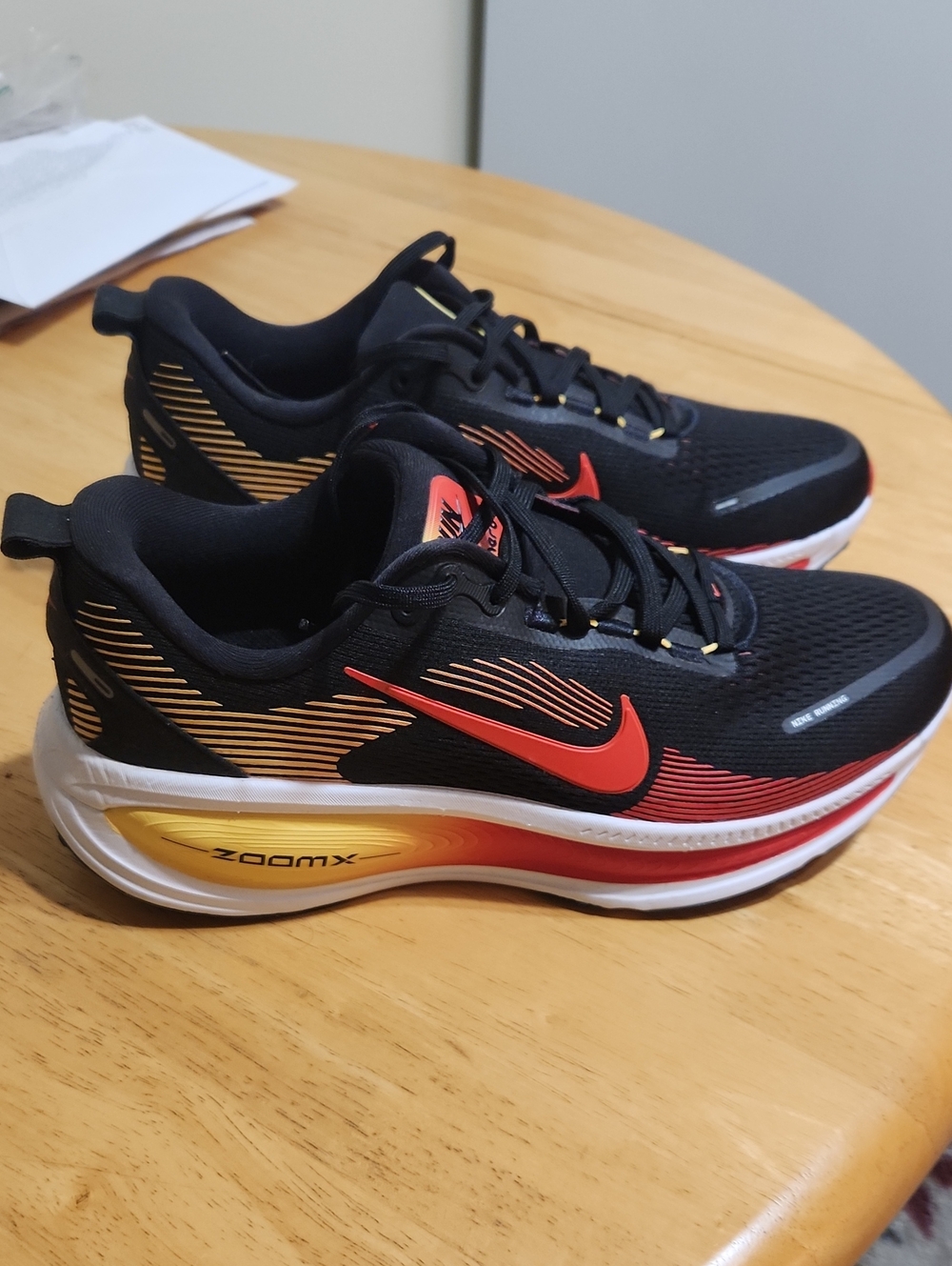 Nike Men’s Black/Red/Yellow VOMERO 18 ZoomX Running Sneakers